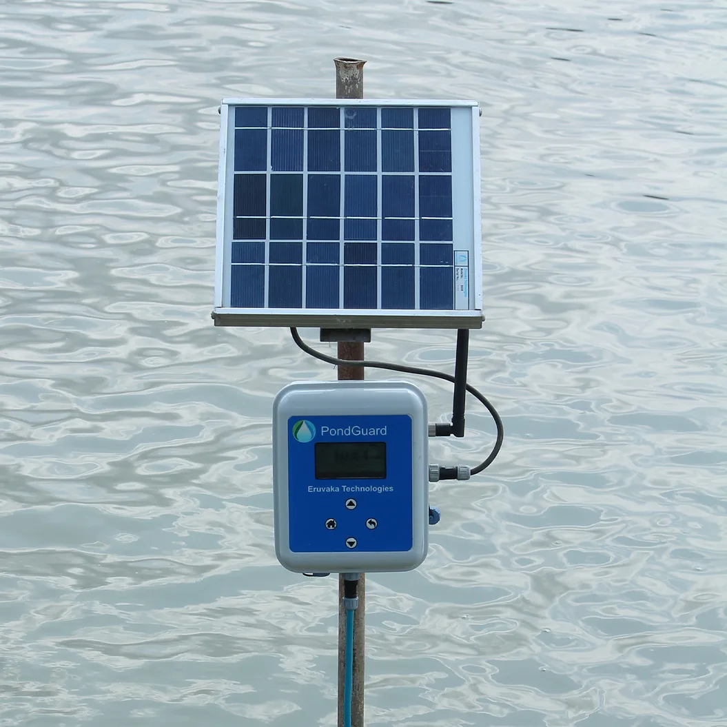 PondGuard monitoring unit and solar panel beside a pond